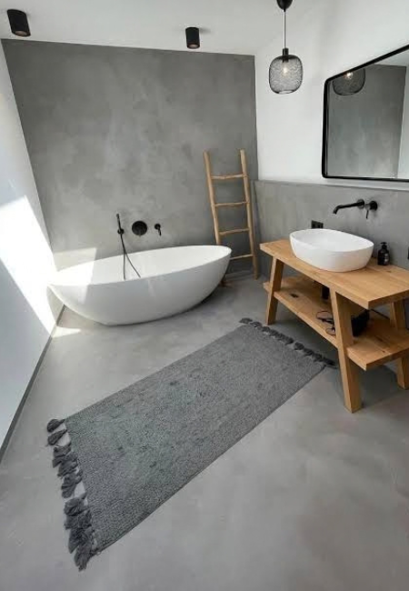 Baño con piso de microcemento